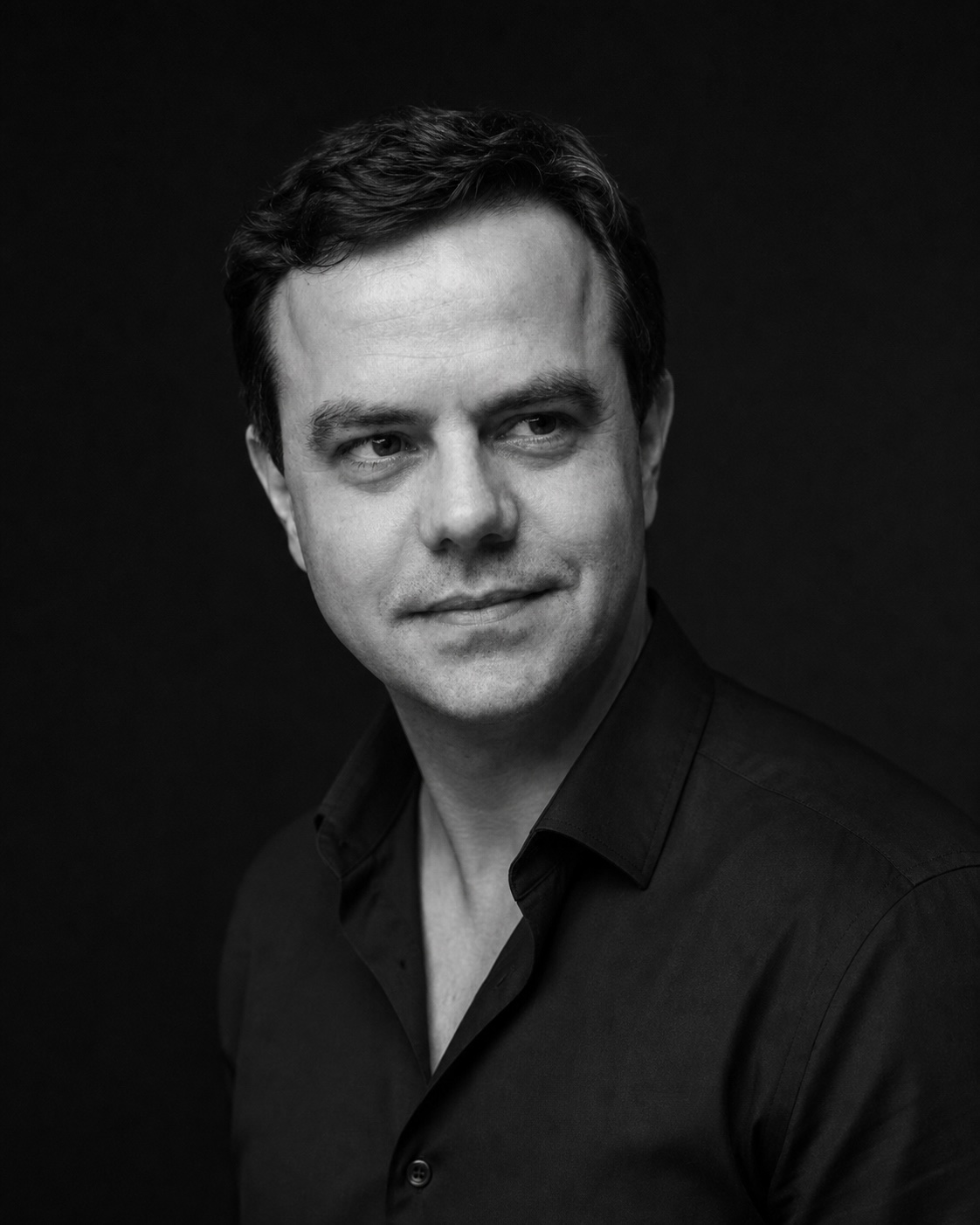 Marcelo do O, co-founder, in a black-and-white portrait.